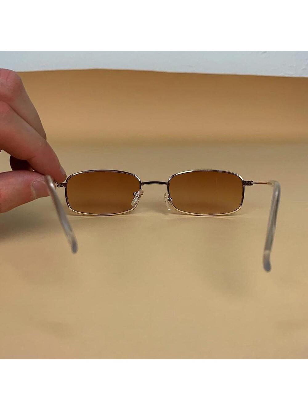 Brown and gold slim sunglasses. Brown trim with brown lenses. Glasses are - Picture 5 of 6